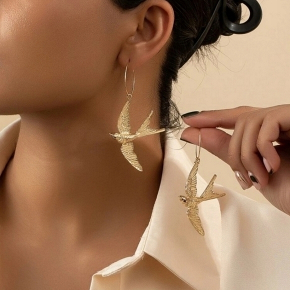 Anthropologie Jewelry - ANTHROPOLOGIE ALLOY SPARROW EARRINGS